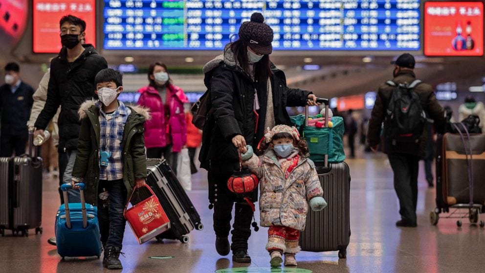 A child wearing a surgical mask